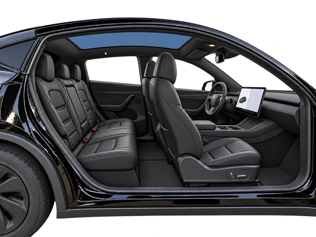 Side cutaway of the cabin showing roomy black leather front and rear seating